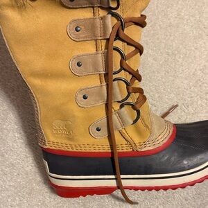 Sorel Women’s Tan and Black Snow Boots with Red Trim
